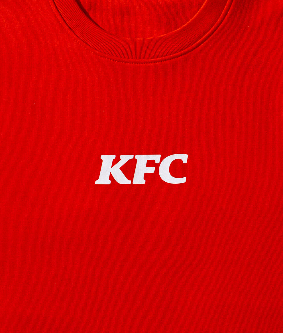 Red junmper with white KFC logo on the front