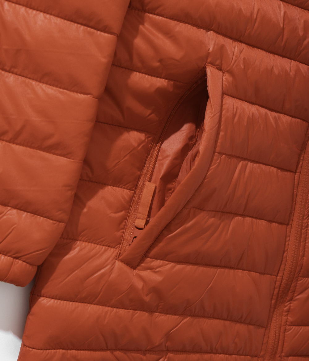 KFC red puffer jacket close up of zip pocket