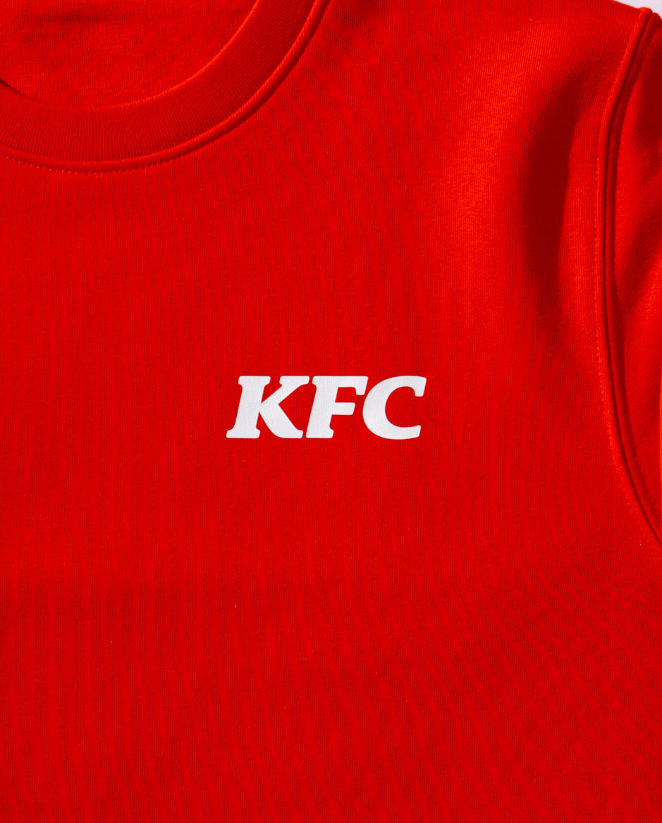 Red junmper with white KFC logo on the front