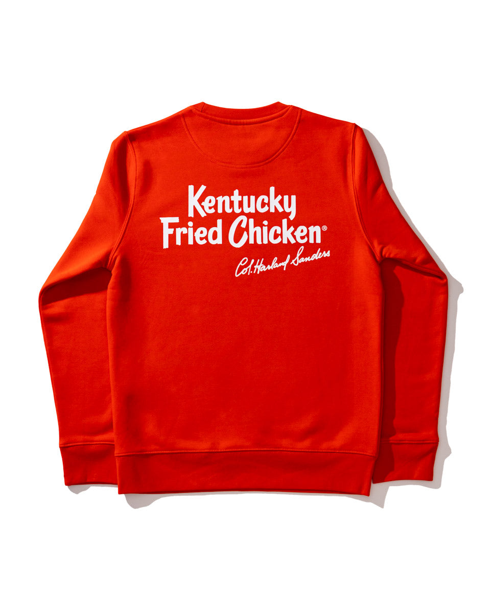 Red junmper with white KFC logo on the back