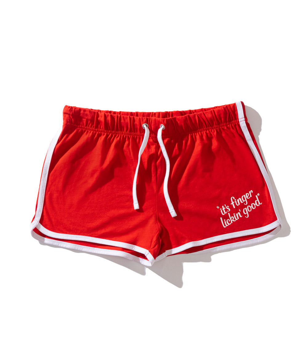 red KFC shorts with white trim and it's finger lickin good slogan
