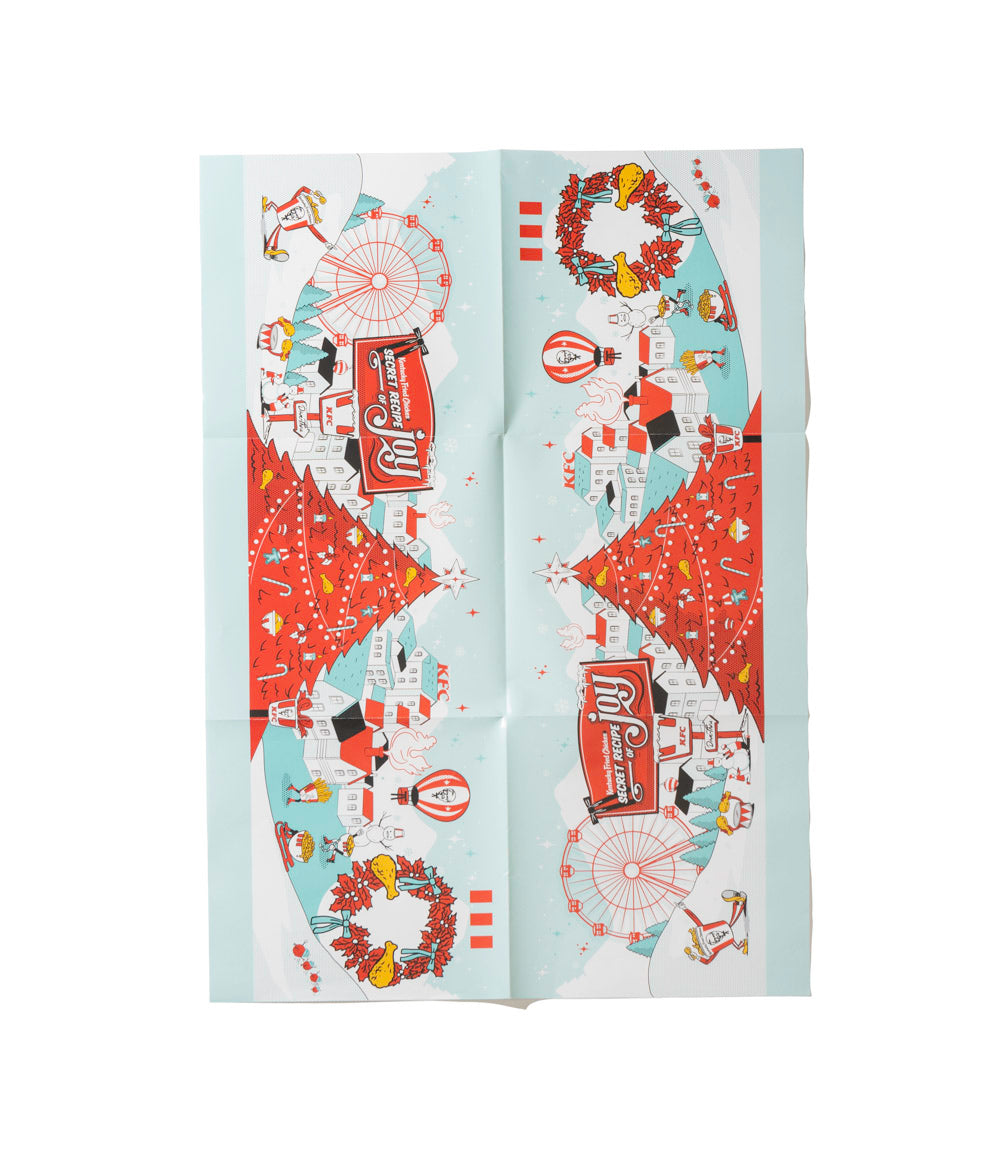 KFC chrismtas wrapping paper with teal blue background and red festive christmas scene